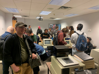 Many Plan 9 developers in a room full of old computers