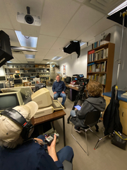 Sound engineer, director, lab manager in the lab with film camera and other equipment